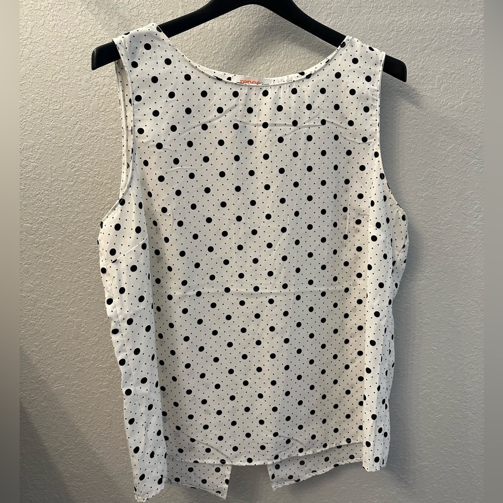 Black and white polka dot sleeveless top